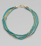 A stunning contrast of bold turquoise beaded strands and radiant, goldtone snake chains in a fluid, multi-row design. TurquoiseGoldtone brassLength, about 17Hook closureImported 