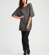 Wrap yourself in this luxe, cozy knit, tailored in a long silhouette with patch pockets for casual style.Boatneck Three-quarter sleeves Ribbed hem Pullover style About 30 from shoulder to hem 33% rayon/23% nylon/18% cotton/18% wool/4% angora/4% cashmere Dry clean Imported