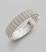 EXCLUSIVELY AT SAKS. A subtle ruffle design in glimmering crystal pavé.Crystal Rhodium plated Width, about ½ Diameter, about 2½ Hinged closure Imported 