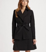 A refined, feminine take on the classic trench, tailored with a slightly fuller skirt and a structured, cropped overlay.Foldover collarNotched lapelsOpen, cropped overlaySelf tie beltFully linedAbout 37 from shoulder to hem82% cotton/18% silkDry cleanMade in France of imported fabricModel shown is 5'11 (180cm) wearing US size 4. 