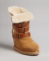 Ash delivers cozy-meets-chic style in these buckled-up wedge booties, perfect for looking cool when temps dip thanks to plush faux shearling.