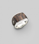 A gleaming, three-sided silver design is offset with inlaid palm wood and a logo accent. About ¾ wide at front Ring, about 1 wide Imported