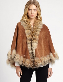 EXCLUSIVELY AT SAKS.COM A luxurious suede style trimmed in natural coyote fur.Oversized coyote fur collarSleeveless cape silhouetteHook-and-eye closureInside lining pocketAbout 29 from shoulder to hemFully linedSuedeSpecialist dry cleanImportedFur origin: USA