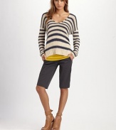 Striped, cotton-rich v-neck in allover stripes with dropped shoulders and a sexy v-back. V-neckDropped shouldersLong sleevesRibbed hemV-back70% cotton/30% nylonDry cleanImportedModel shown is 5'10 (177cm) wearing US size 4.