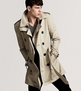 An undisputed classic from Burberry, the double-breasted trench coat brings understated style to blustery days.