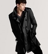 An undisputed classic from Burberry Brit, the double-breasted trench coat brings understated style to blustery days.