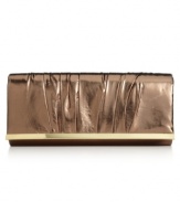A party-right pick, this mod metallic clutch form La Regale shines after hours. Elegant ruched detailing adorns the outside, while a slender shoulder strap can be discretely hidden within.