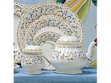 Toscana is a festive pattern with cheerful colorwashes on a beautiful French faience body.