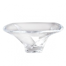 Exuding the grace of a ballet dancer, the Piroett Bowl brims with artistic flair. Artist Lisa Smith designed the full-lead crystal piece with a square rim and undercut sides that seem to be unfurling as they spin up and off the heavy, square base. Exuding the grace of a ballet dancer, the Piroett Bowl brims with artistic flair. Artist Lisa Smith designed the full-lead crystal piece with a square rim and undercut sides that seem to be unfurling as they spin up and off the heavy, square base.