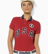 An essential short-sleeved polo shirt is crafted in breathable cotton mesh with bold country embroidery, celebrating Team USA's participation in the 2012 Olympics.