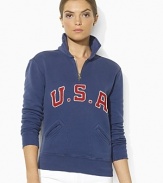 A half-zip mockneck pullover is crafted from ultra-soft fleece, gently washed with applied country patchwork at the front, celebrating Team USA's participation in the 2012 Olympics.