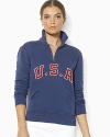 A half-zip mockneck pullover is crafted from ultra-soft fleece, gently washed with applied country patchwork at the front, celebrating Team USA's participation in the 2012 Olympics.