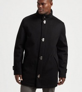 The classic car coat cut from luxurious cashmere and finished with distinctive gancini closures.Stand collarFront gancini closureSlash pocketsAbout 35 from shoulder to hemCashmereDry cleanMade in Italy