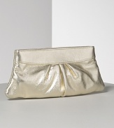Lauren Merkin Eve textured lambskin leather clutch is undeniably modern and chic. Pleated detail for textural interest. Opens to a hexagonal frame and secures with a hinge closure. Interior zip pocket. Signature pink striped shimmer lining.