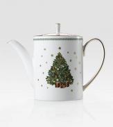 A festive Christmas tree surrounded by golden stars adorns this charming holiday teapot of fine bone china edged in 24k gold with a graceful laurel leaf border.Bone china9 diameter X 5HHand washImported