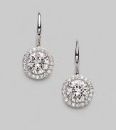 EXCLUSIVELY AT SAKS. A traditional round drop earring designed in sterling silver with cubic zirconia settings.Cubic zirconia Rhodium plated sterling silver Width, about ½ Leverback closure Imported 