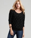 C by Bloomingdale's lends glamour to your every day with rhinestone embellishments. Dolman sleeves create an effortless silhouette.