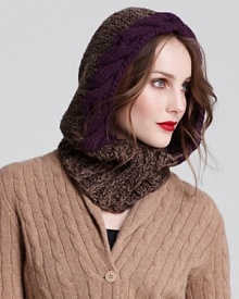 Wrap up in style as the degrees drop with this chunky knit hoodie from Echo. A braided trim lends added texture and frames the face. Wrap up in style as the degrees drop with this chunky knit hoodie from Echo. A braided trim lends added texture and frames the face.