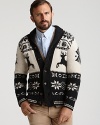 Celebrate the season in this classic Moncler shawl cardigan with wooden buttons and a retro reindeer design.