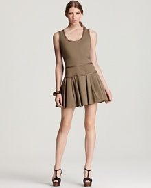 A full pleated mini skirt swings from a paneled waist on this See By Chloé sleeveless dress, creating a fun and flirty look to take you from day into evening in charming style. A full pleated mini skirt swings from a paneled waist on this See By Chloé sleeveless dress, creating a fun and flirty look to take you from day into evening in charming style.
