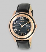 Perfect for the sophisticated man, a black-and-gold beauty with modern numeric markers and a sleek leather strap.Quartz movementWater resistant to 10 ATMRound rose gold IP and glass case, 45mm (1.8)Smooth rose gold IP bezelBlack dialNumeric markersDate display at 3 o'clockSecond handBlack leather strapImported