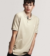 Exude effortless style with Burberry's classic polo.