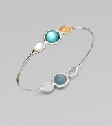 From the Wonderland Collection. Three faceted, silver-framed stones on one side, three on the other, define this slender bangle of hammered silver with colorful layered doublets, creamy mother-of-pearl and radiant clear quartz.Mother-of-pearl and clear quartzSterling silverDiameter, about 2½Imported