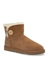 Introducting the Mini Bailey bootie from UGG® Australia--a short design featuring a subtle button detail.