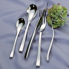 Nicola Flatware by Couzon features a heavy weight and contemporary curves for the modern table. The signature offset knife blade feels very natural in the hand. Perfectly balanced, superior 18/10 quality. Nicola Flatware by Couzon features a heavy weight and contemporary curves for the modern table. The signature offset knife blade feels very natural in the hand. Perfectly balanced, superior 18/10 quality.