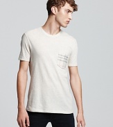 Burberry's signature check print makes an appearance on the chest pocket of this timeless, soft cotton tee.