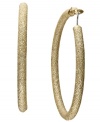 A style must-have, every girl needs at least one pair of hoops in her accessory collection. INC International Concepts' style features a diamond dust design set in gold-plated mixed metal. Approximate diameter: 2 inches.