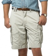 Plain front, relaxed fitting chino cargo shorts. Tightly woven cotton for style and durability. Soft washed for lived-in character and softness. Quarter top pockets and side cargo flap pockets offer cool, classic appearance. Relaxed, comfortable style. Pocket flaps feature taping detail. 8 inseam.