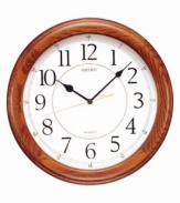 This handsome wall clock from Seiko features a beautiful solid oak case. Round white dial with logo, numeral indices and quiet sweep second hand. One AA battery included. Measures approximately 13 inches in diameter and 1-1/2 inches deep.