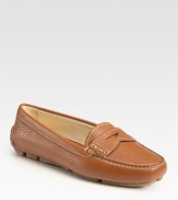 Soft leather in a timeless moccasin-inspired silhouette. Leather upper Leather lining Rubber sole Padded insole Made in ItalyOUR FIT MODEL RECOMMENDS ordering one half size up as this style runs small. 