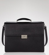 Salvatore Ferragamo Revival double gusset briefcase. Textured leather briefcase with lock combination on front. Features topstitching detailing, internal pockets and expandable folders on side.