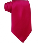 Cool confidence isn't about shrinking into the shadows, it's all about marching to the office with the can-do attitude afforded by this bold solid tie from Donald Trump.