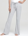 Lounge around in style and comfort. Juicy Couture's drawstring pants in soft fabric with lace detail.