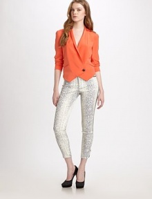 Luxe python-print lends a touch of glam this this oh-so-sleek silhouette tailored with a sophisticated crop.Tab-front waistZip-flyFlat frontSlash pocketsSide pipingZipper hemsBack patch pocketsRise, about 7½Inseam, about 28½65% polyseter/33% viscose/2% elastaneDry cleanImportedModel shown is 5'10½ (179cm) wearing US size 4.