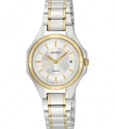 Graceful gold tone accents adorn the classic styling of this stunning Seiko timepiece.