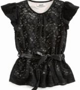 Pretty lace in true lady-like form. She'll don her DKNY ribbon-tie top for every special occasion this season.