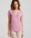 A ultra soft short sleeve henley sleep tee with ornate embroidered detail along a v-neckline.