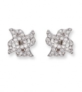 Dainty X-shaped clip on earrings flaunt clear Swarovski crystals in a pavé setting. These silver tone mixed metal earrings bridge the gap between classic and trendy. Approximate diameter: 5/8 inch.