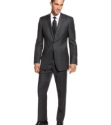 Want to give your tailored wardrobe a quantum leap onto the cutting edge? Make this slim-fitting charcoal suit from Calvin Klein offers the stylish update you're after.