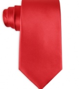 Smooth sophistication and modern convenience go hand in hand with this solid machine washable tie from John Ashford.