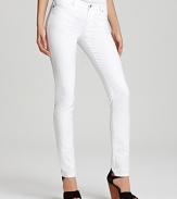 Gleaming silver-toned signature accents enhance the crisp white hue of these MICHAEL Michael Kors jeans, cut in a slim silhouette for an all-around on-trend look.