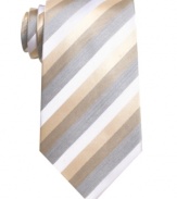 With a sleek modern stripe and refreshing color palette, this tie from Geoffrey Beene will instantly boost your office attire.