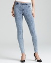 Stretchy leggings with functional back pockets in a stone washed jean style.