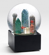 EXCLUSIVELY OURS. The Dallas musical water globe features city scenes and landmarks including: Reunion Tower, Magnolia Building First Interstate Tower, Big Tex and more Plays Deep In The Heart Of Texas Glass dome and resin figures 6 high Imported