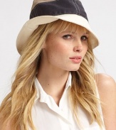A colorblocked design with stitched accents, perfect for travel or everyday. LinenBrim, about 2½Dry cleanMade in Italy