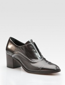 Traditional design enlivened by glistening metallic leather and a unique lace-less front. Stacked heel, 2¼ (60mm) Metallic leather upper Leather lining and sole Padded insole Made in ItalyOUR FIT MODEL RECOMMENDS ordering one half size up as this style runs small. Traditional design enlivened by glistening metallic leather and a unique lace-less front. Stacked heel, 2¼ (60mm) Metallic leather upper Leather lining and sole Padded insole Made in ItalyOUR FIT MODEL RECOMMENDS ordering one half size up as this style runs small.